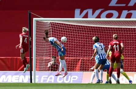 Denise O’Sullivan scores a header at St Helens Stadium